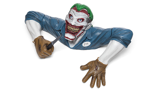 Illustration for article titled Half Of The Joker's Torso Is The Creepiest Lawn Ornament Ever